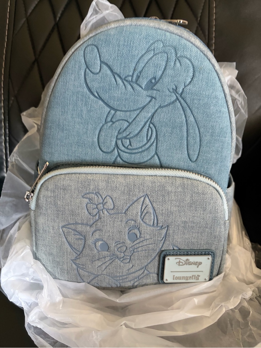 Loungefly Light Blue Denim Backpack with Pluto & Marie Embossed